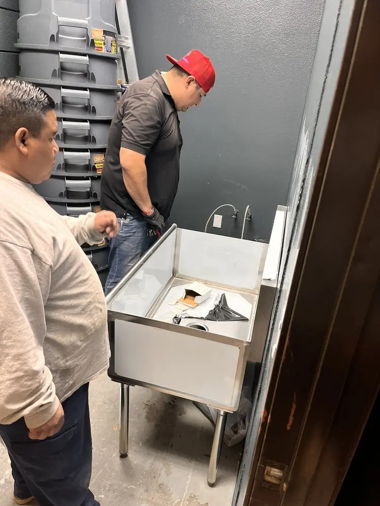 Commercial plumbing and sink installation in King